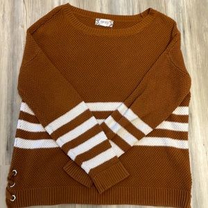 Beautiful fall sweater with a little detailing on the the sides!